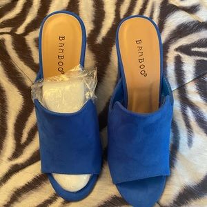 Blue heels,brand new, in the box. Size7